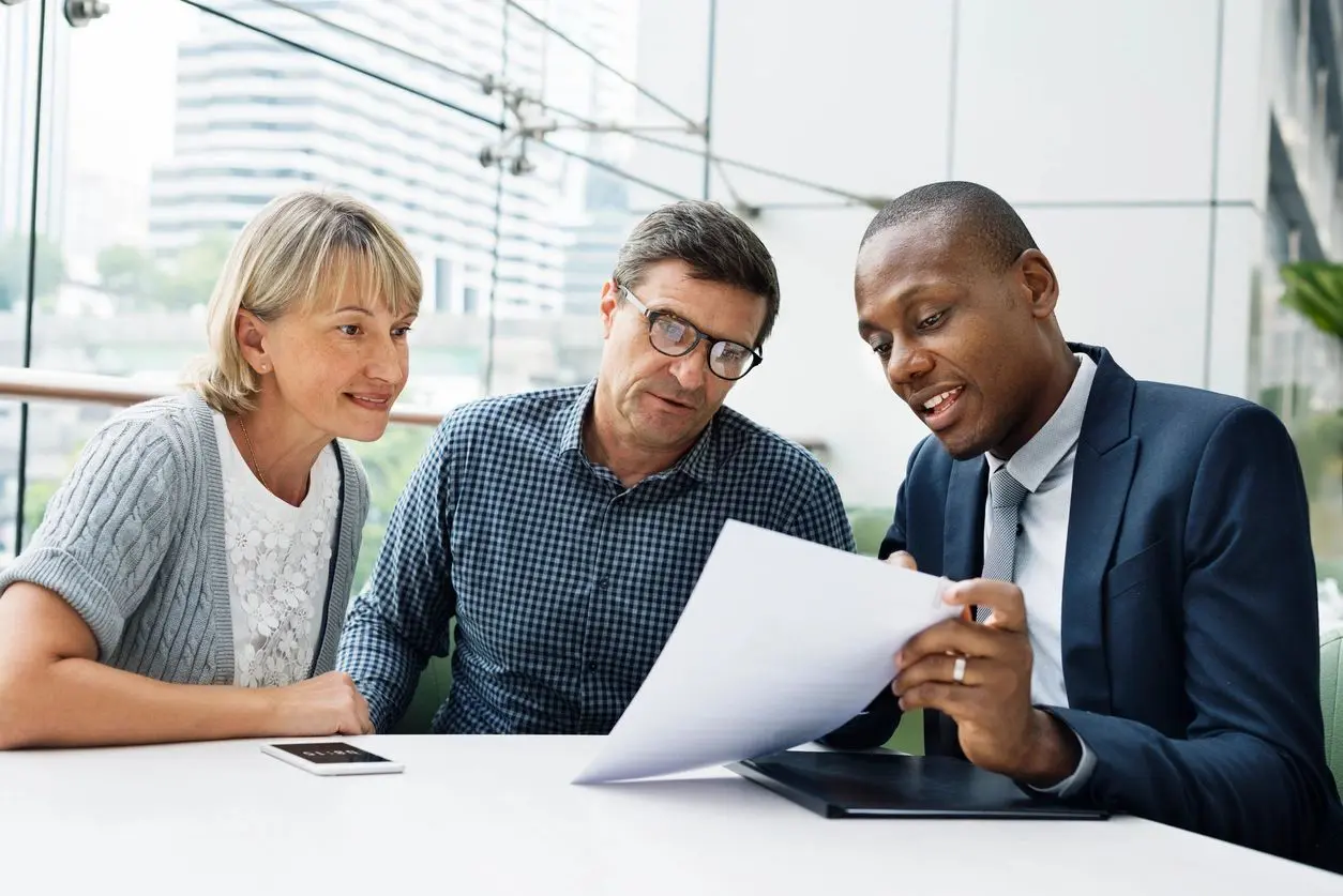 An employee going over his federal employee retirement planning